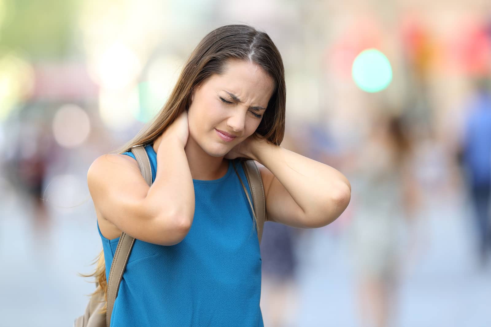 woman suffering neck ache