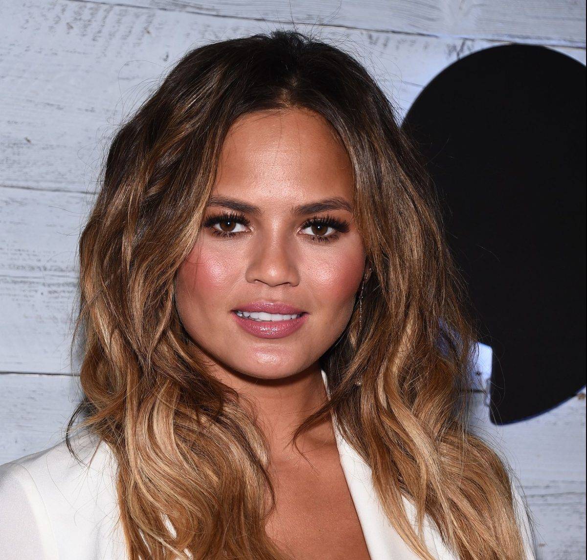Chrissy Teigen's phone number was on her new cookbook & it was the dog's fault!