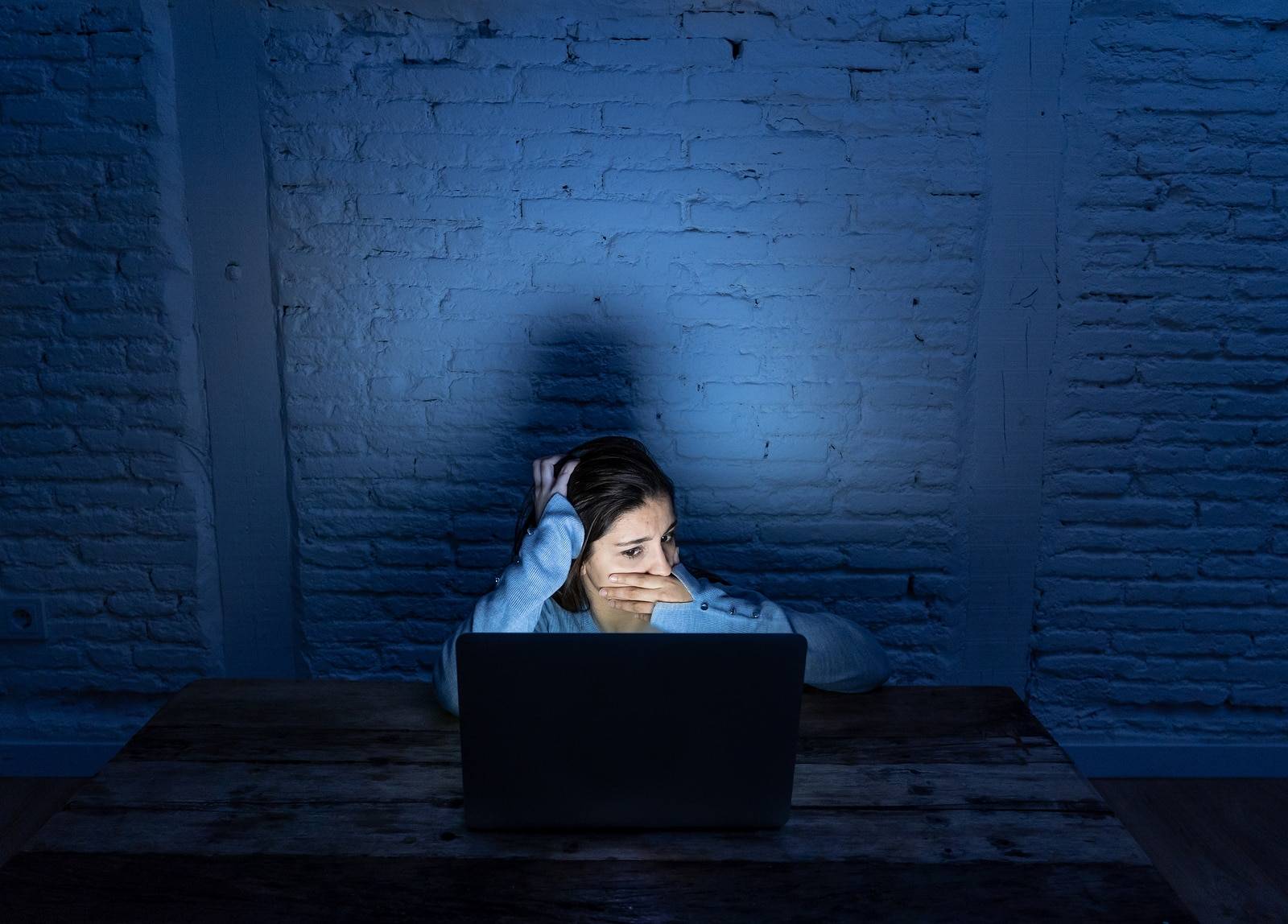 Scared Woman On Laptop
