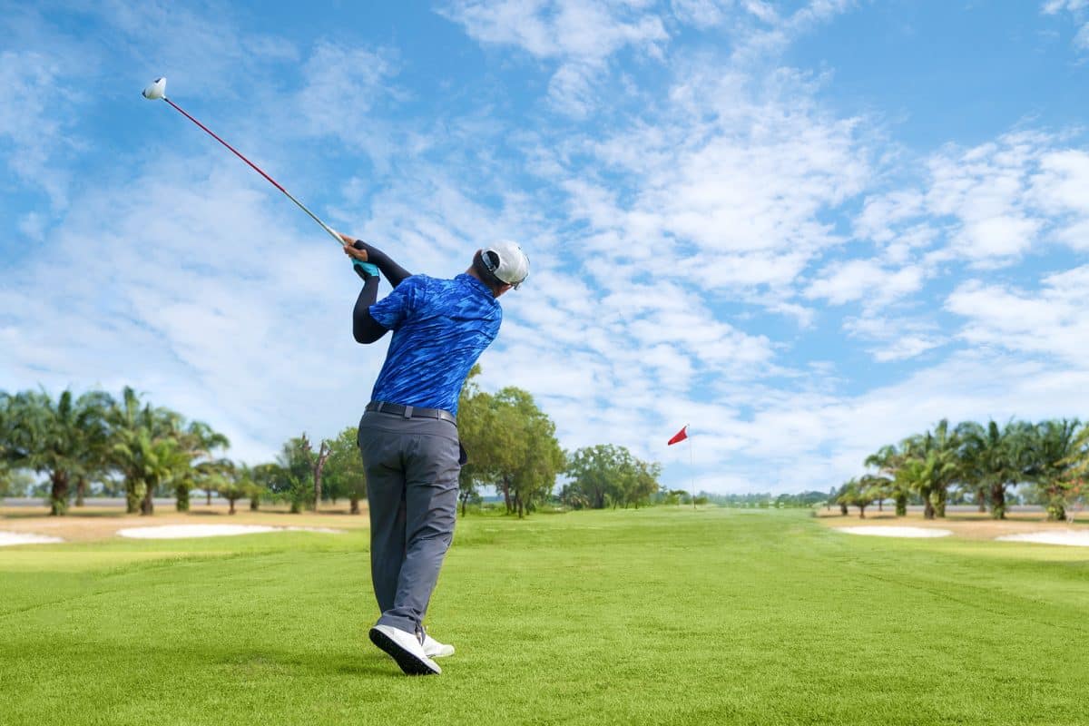 Man playing golf