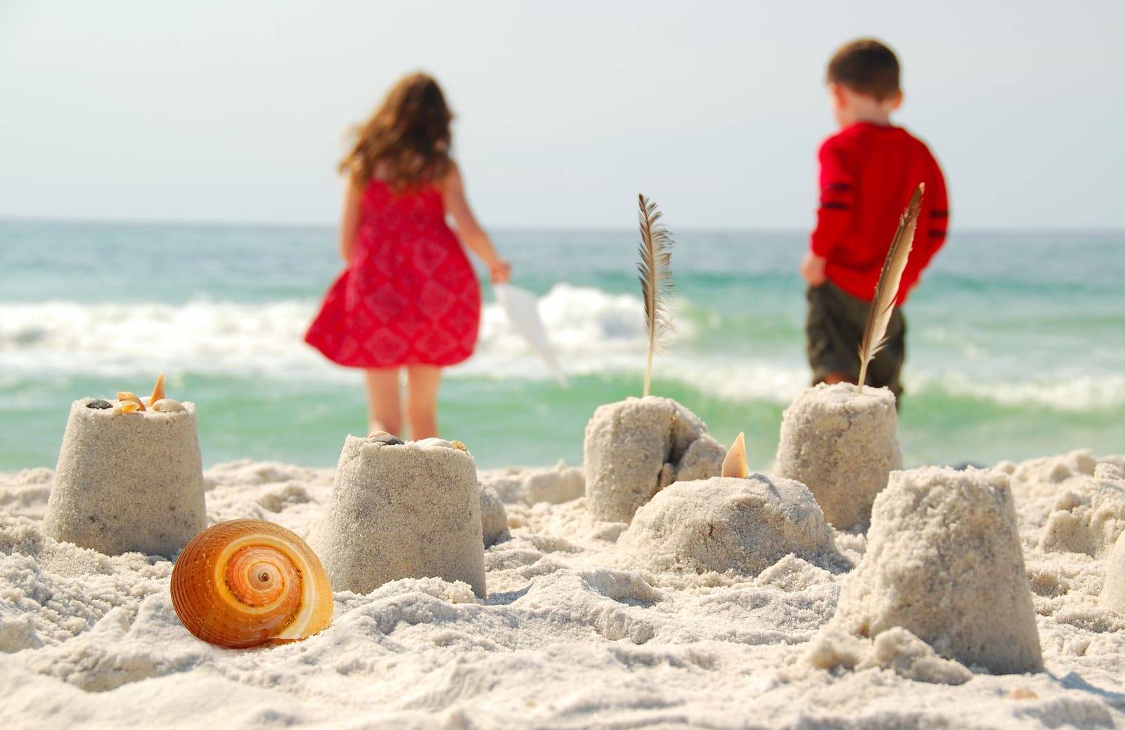 Young children playing at seashore