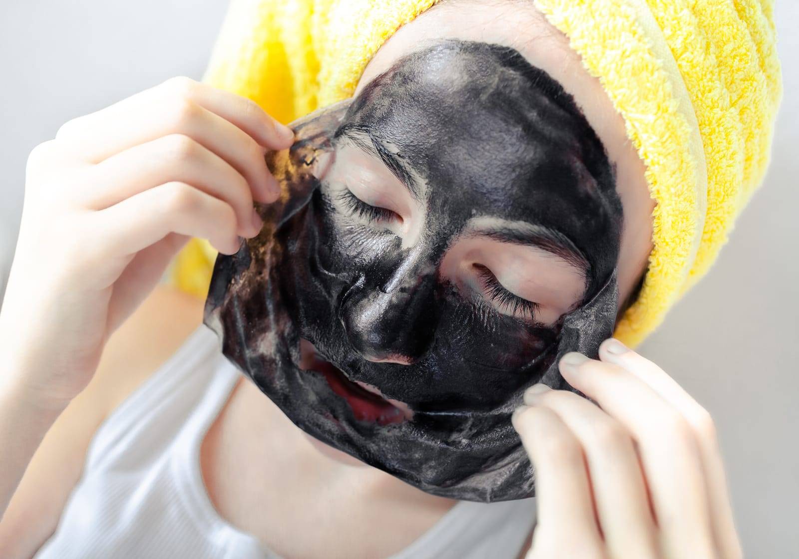 black facial peel off mask.