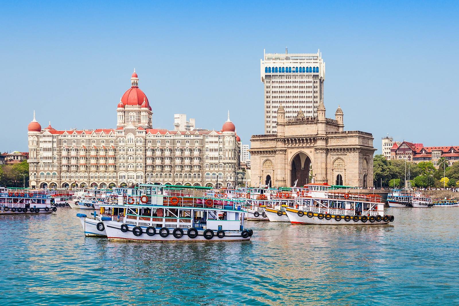 The Gateway of India and boats as seen from the Mumbai Harbour in Mumbai, India