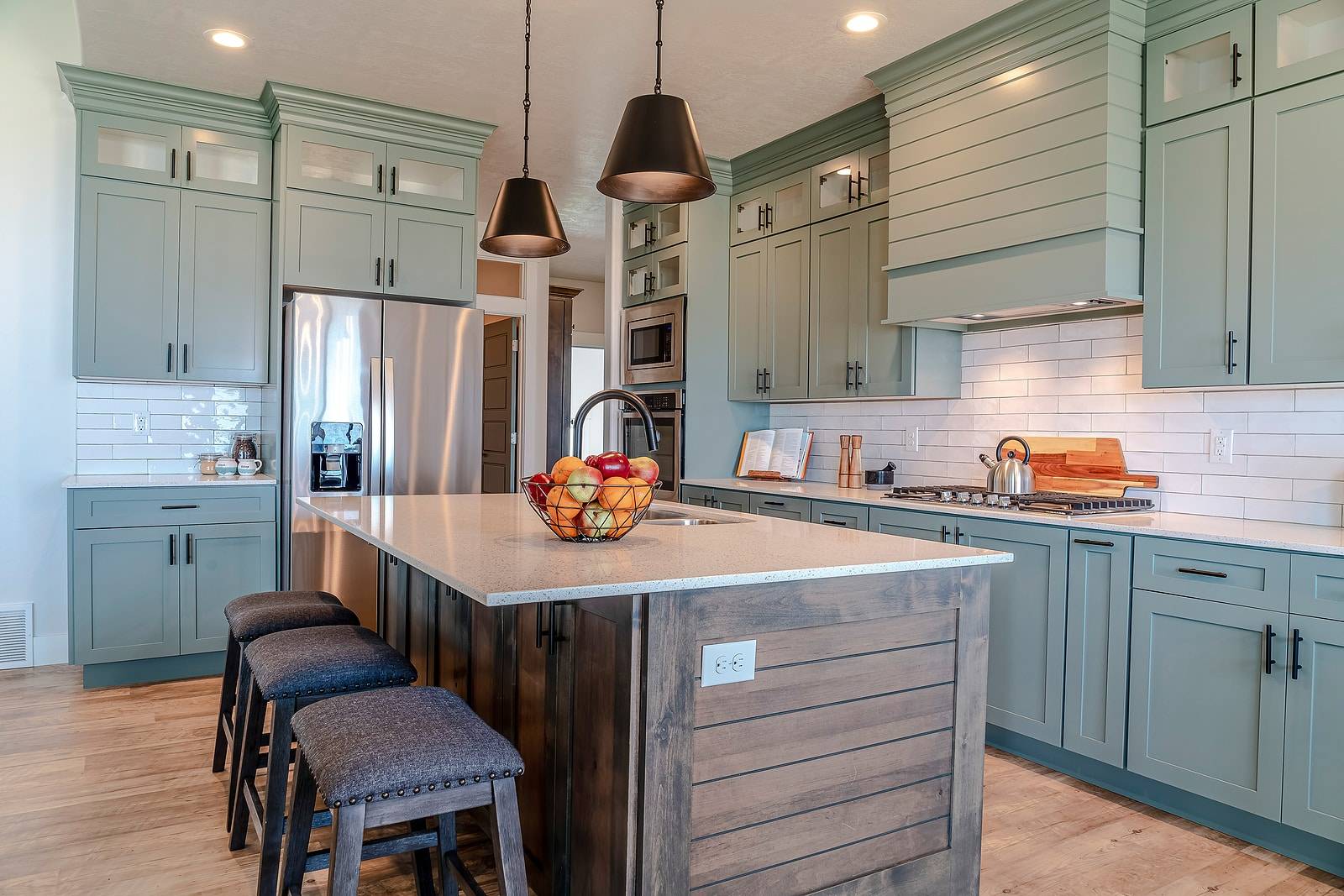 Kitchen island with cushioned stools