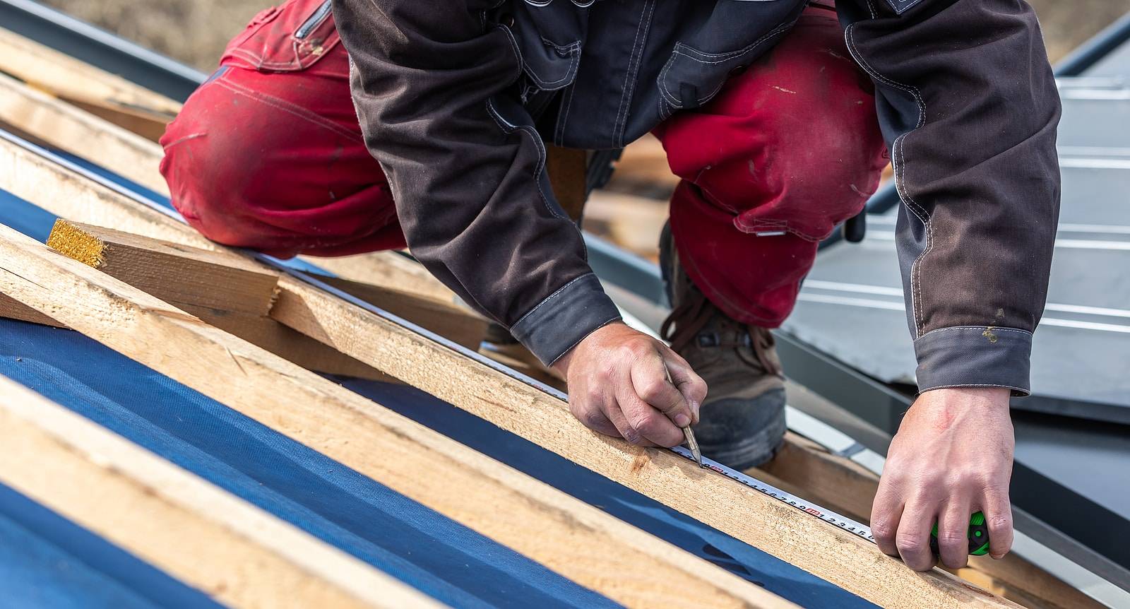 construction worker install a new roof,