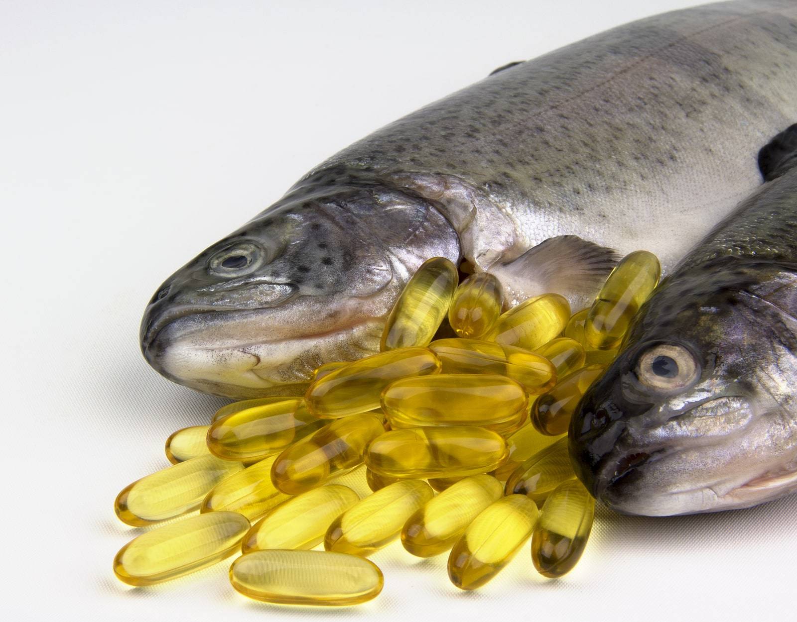 Fresh Rainbow trout and fish oil capsules