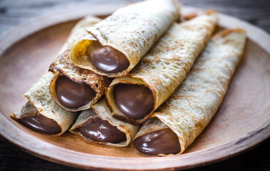 Crepes With Chocolate Cream On The Plate